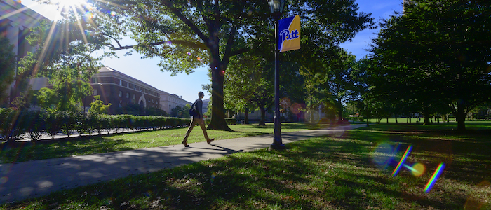 student walking on campus