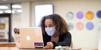 student working on laptop