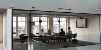 people sitting at a conference table