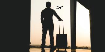 silhouette of person in airport