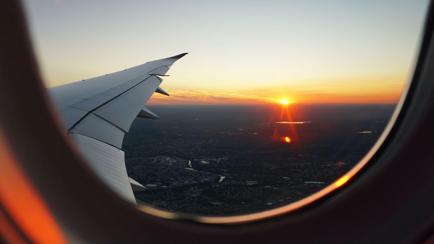 airplane window sunset